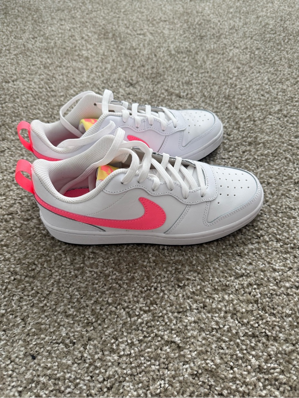 Nike White Low-Top Sneakers with Neon Pink Swoosh